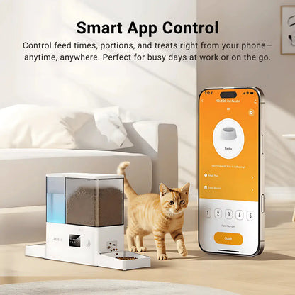 Smart pet feeder with a cat and smartphone displaying app interface on a light background